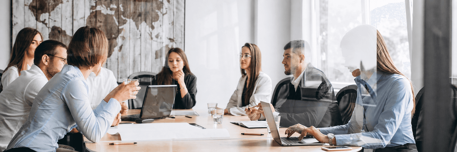 Leadership team collaborating in a modern office